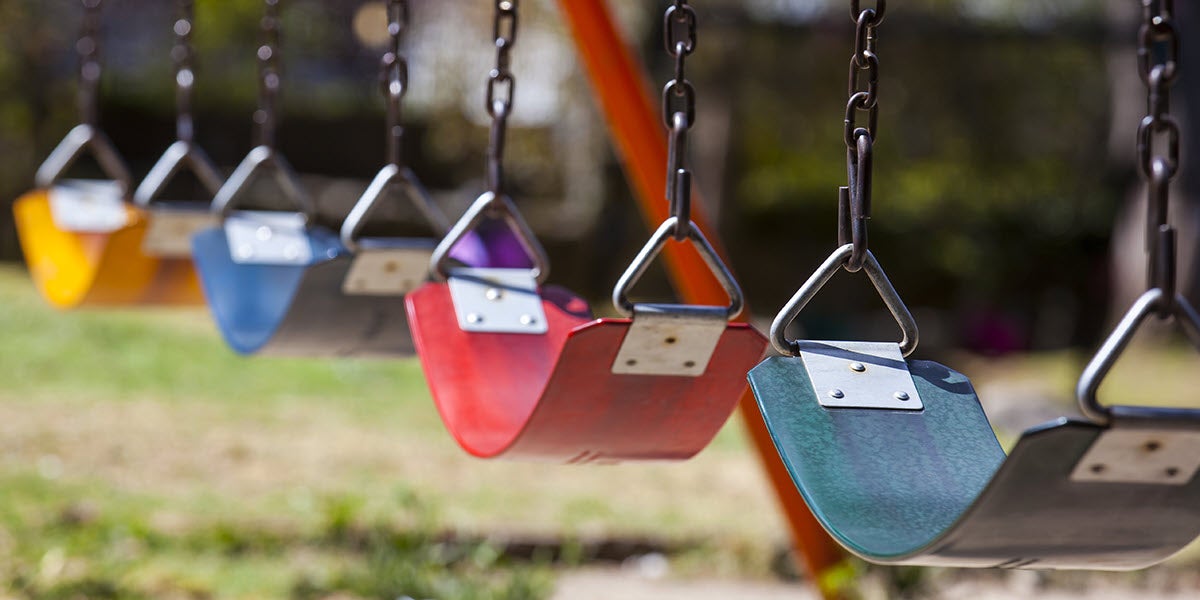 A group of swings in a park