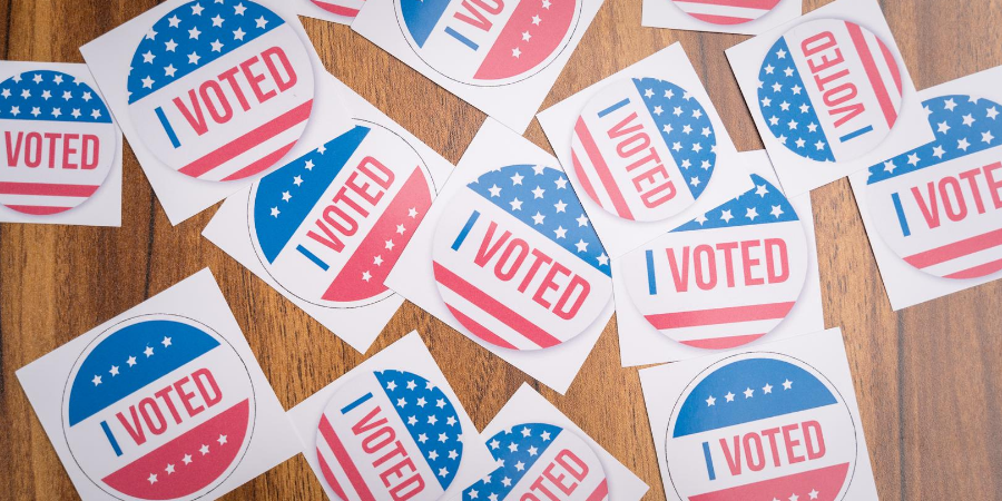 Tabletop covered in I Voted stickers