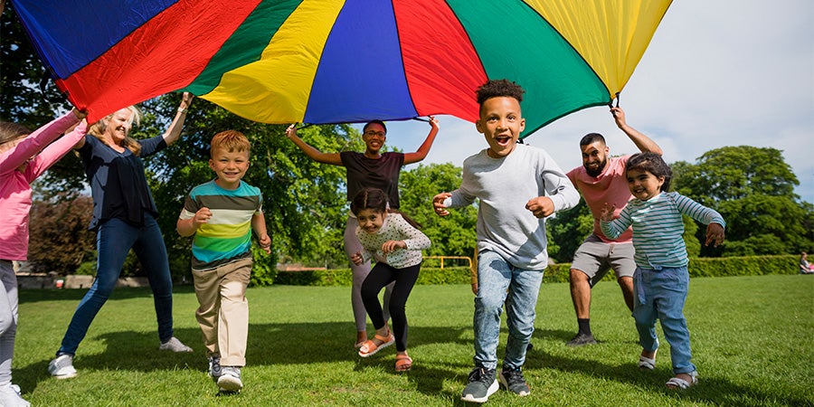 Kids running from multi-colored circle