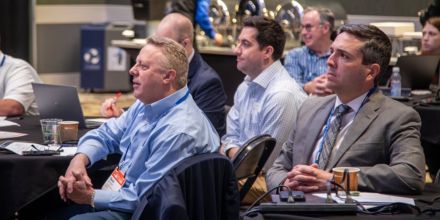 photo of attendees listening at csa meeting 