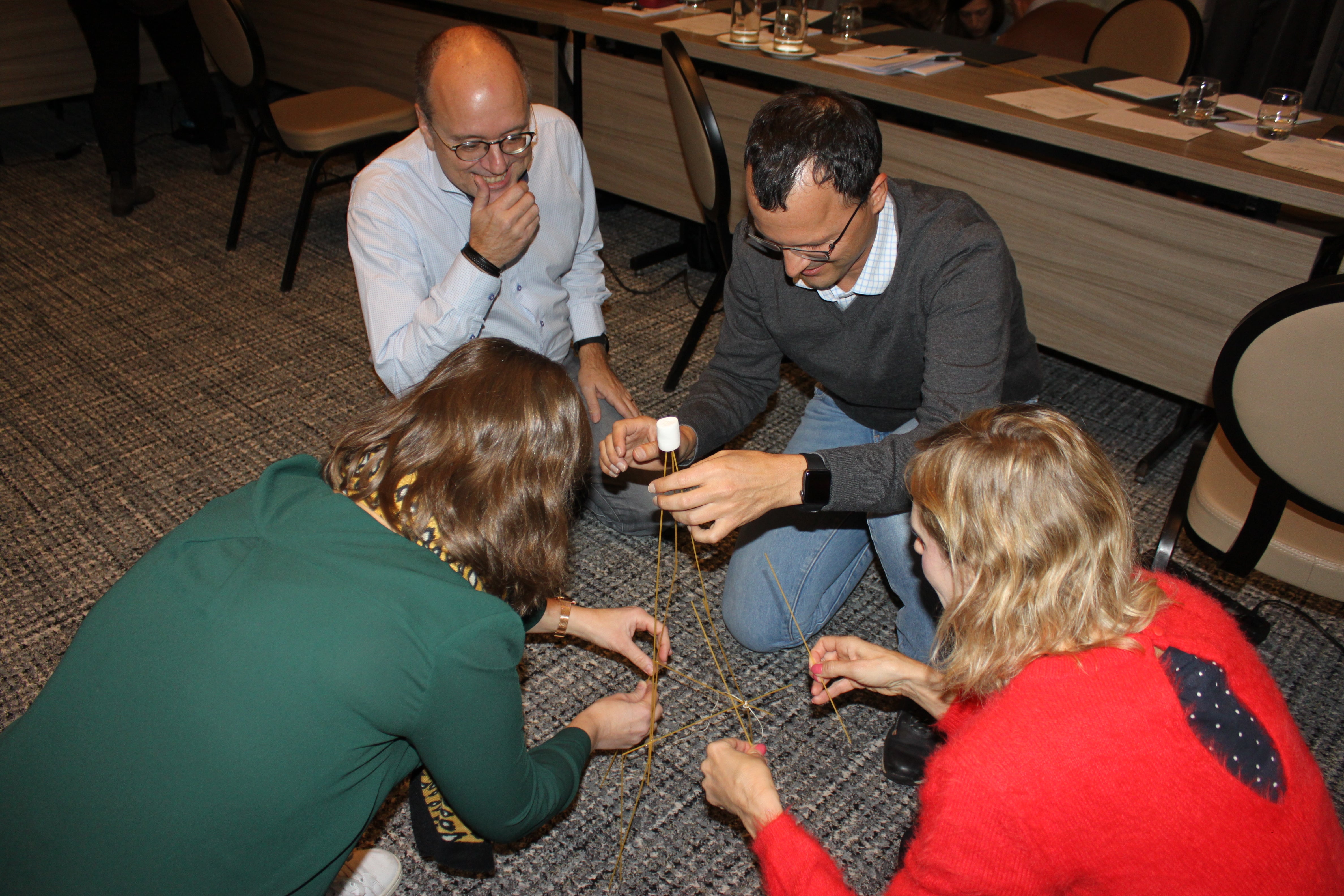 Team building at kick-off meeting: building the highest spaghetti tower.