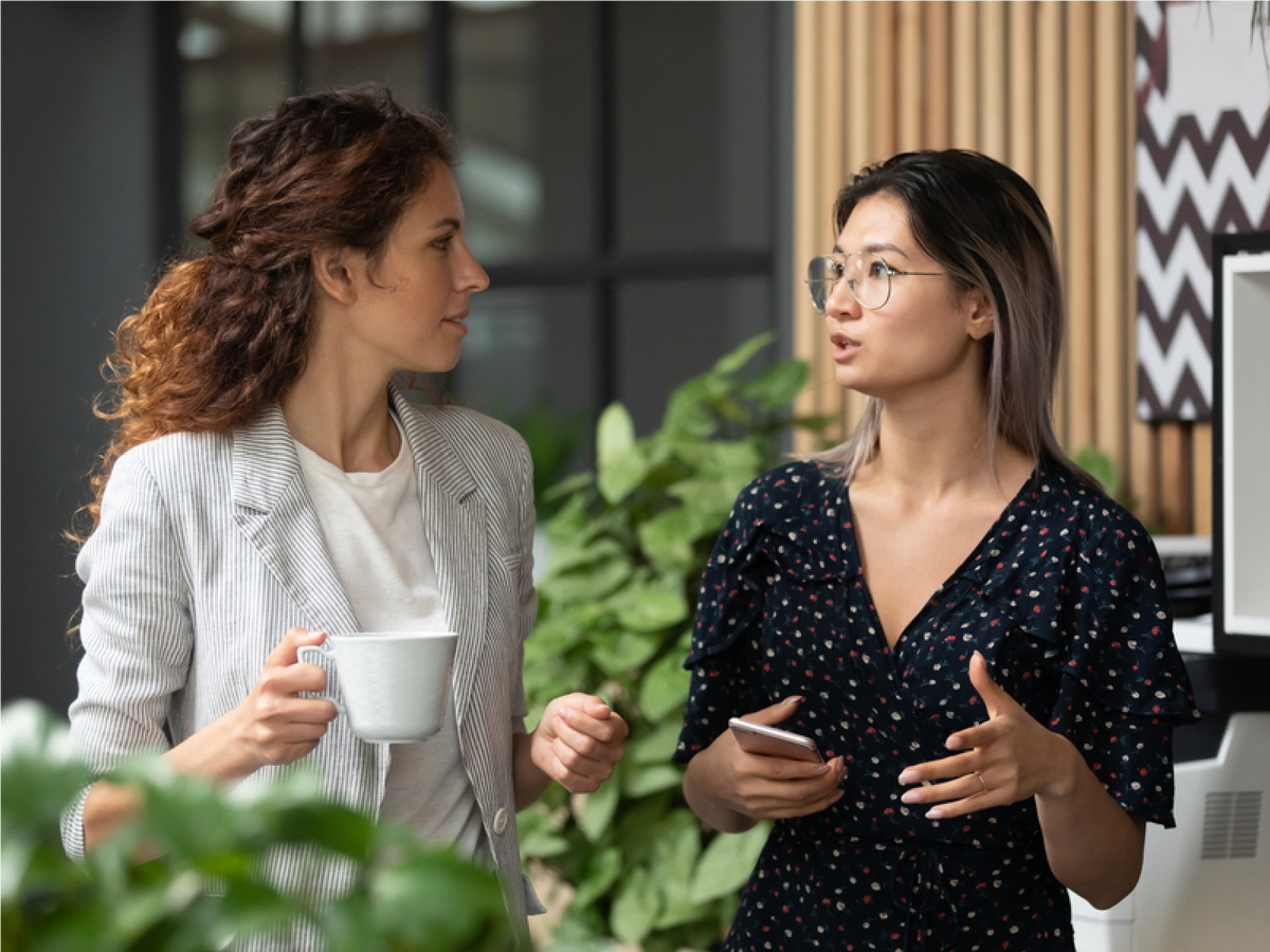 Two employees having a conversation
