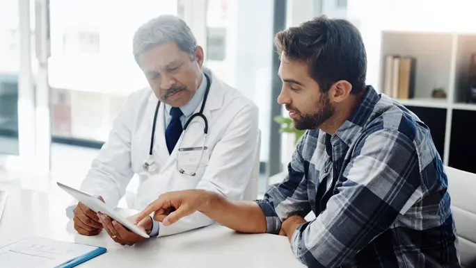 Man having a check up with his GP
