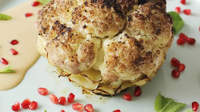 Roasted Cauliflower with Tahini Dressing & Pomegranates