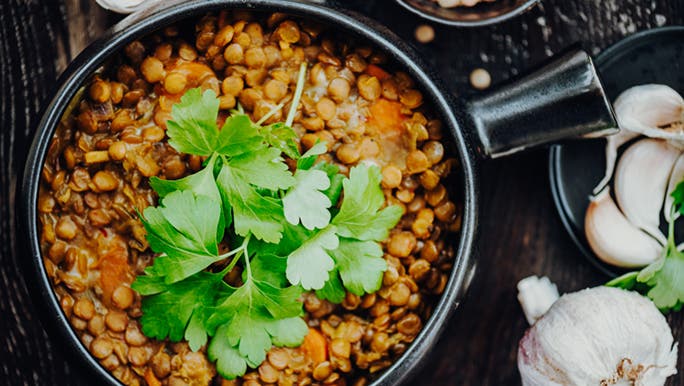 A lentil based vegan protein meal sits in a bowl.
