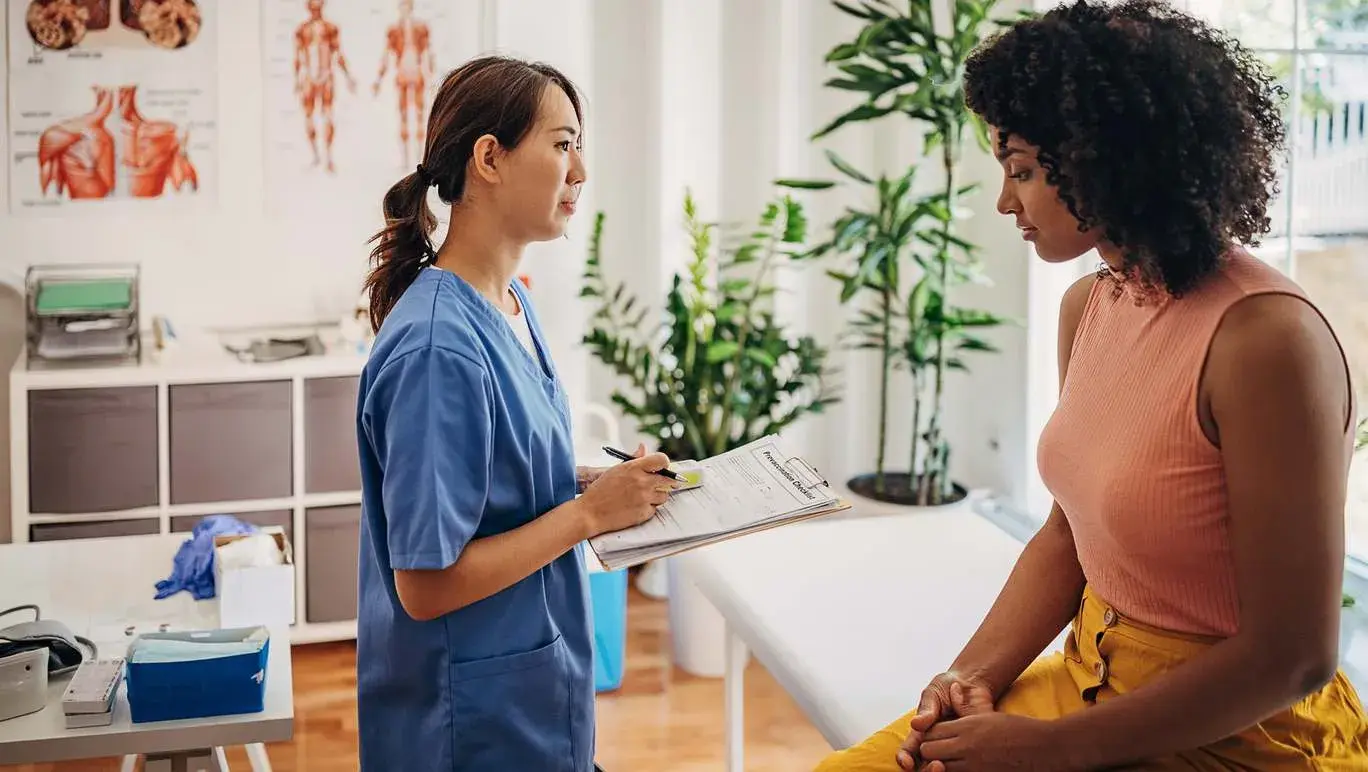 Young woman getting a health check at doctors