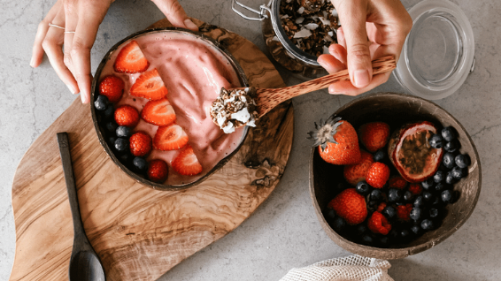 Berry smoothie in a coconut bowl