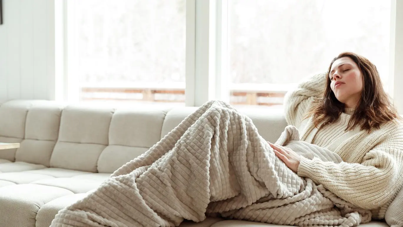 woman-with-the-flu-on-couch-b.webp