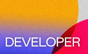 A colorful background with white text saying Developer