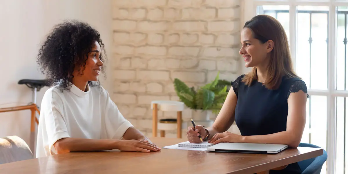 an employer interviewing a potential job candidate