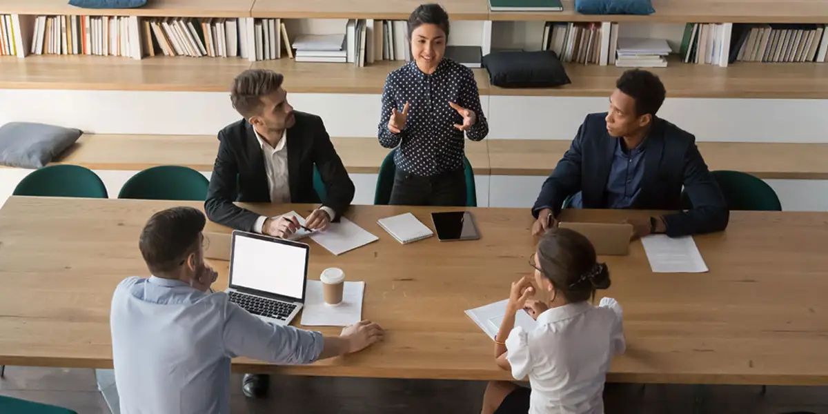Executives having a meeting?fm=webp&q=65
