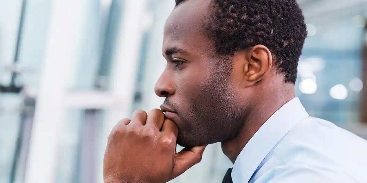 man reflecting on self-awareness and leadership