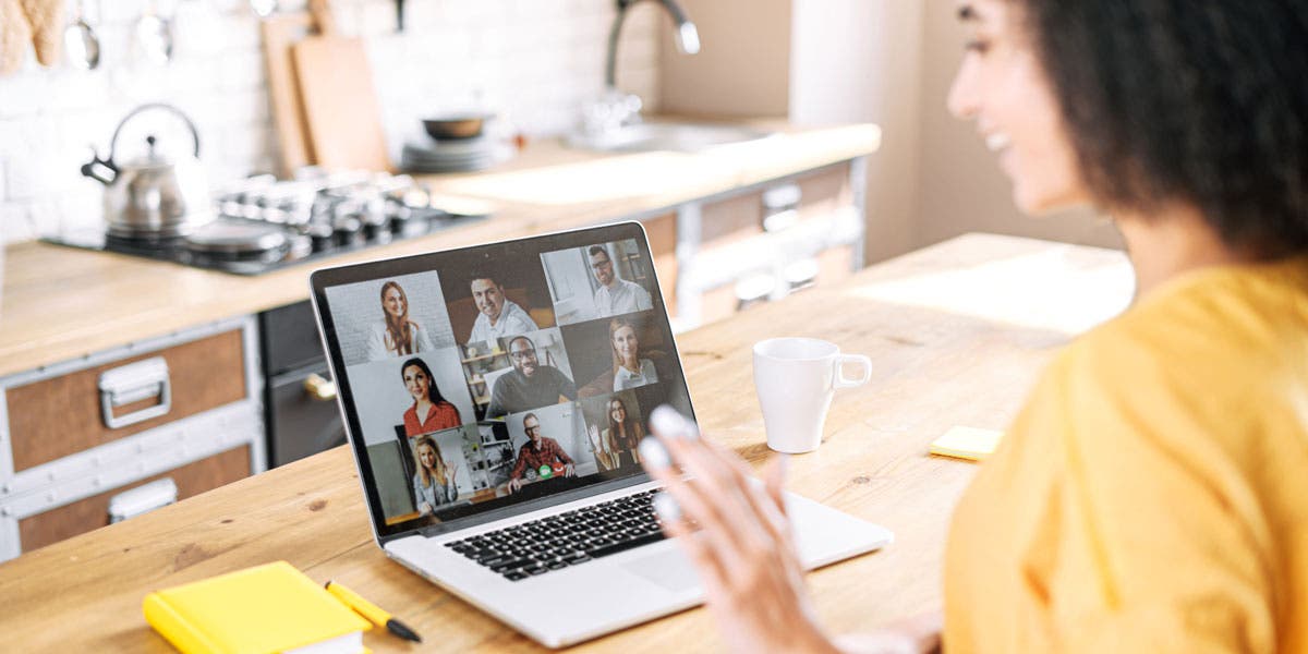 female holding a virtual meeting with her team