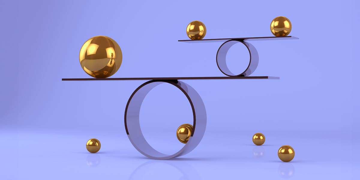 spheres and circles balancing on a teeter totter