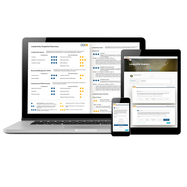 laptop, tablet, and phone with screenshots of leadership test results from DDI's Leadership Snapshot assessment ?auto=format&q=75