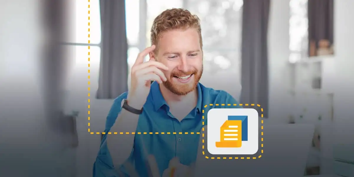 man smiling happily towards his laptop as he practices DDI's star method for interviewing