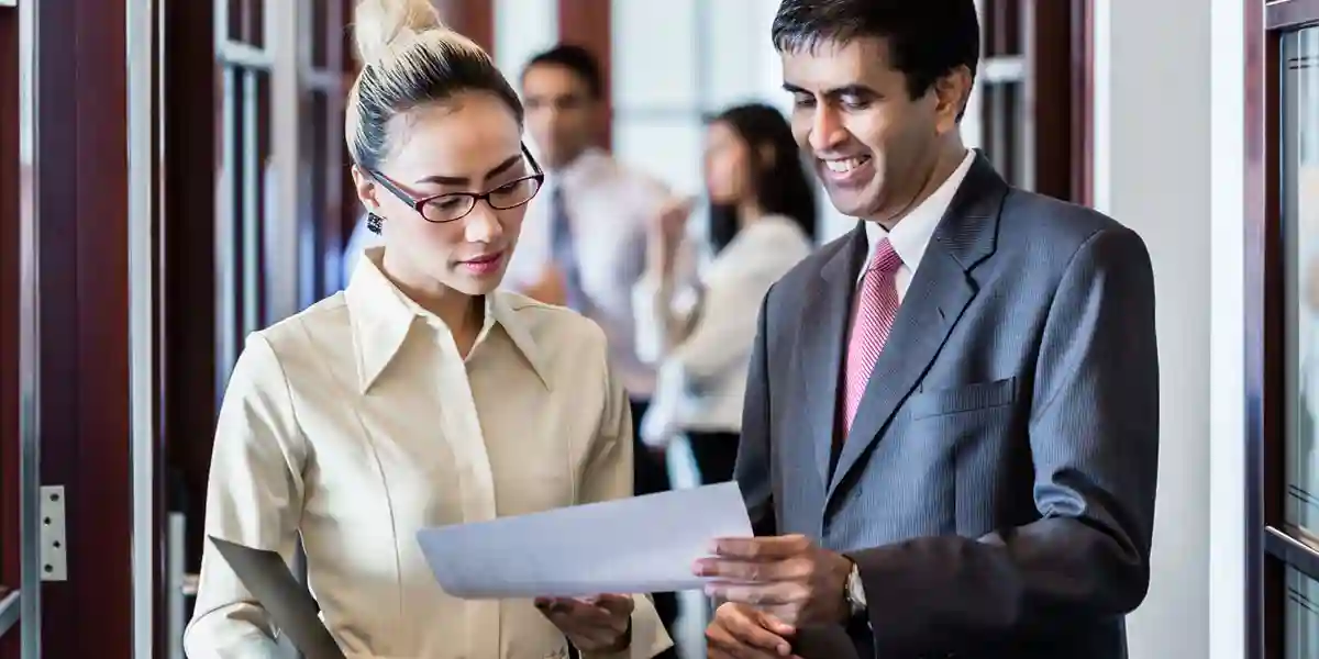 male and female leaders in a discussion