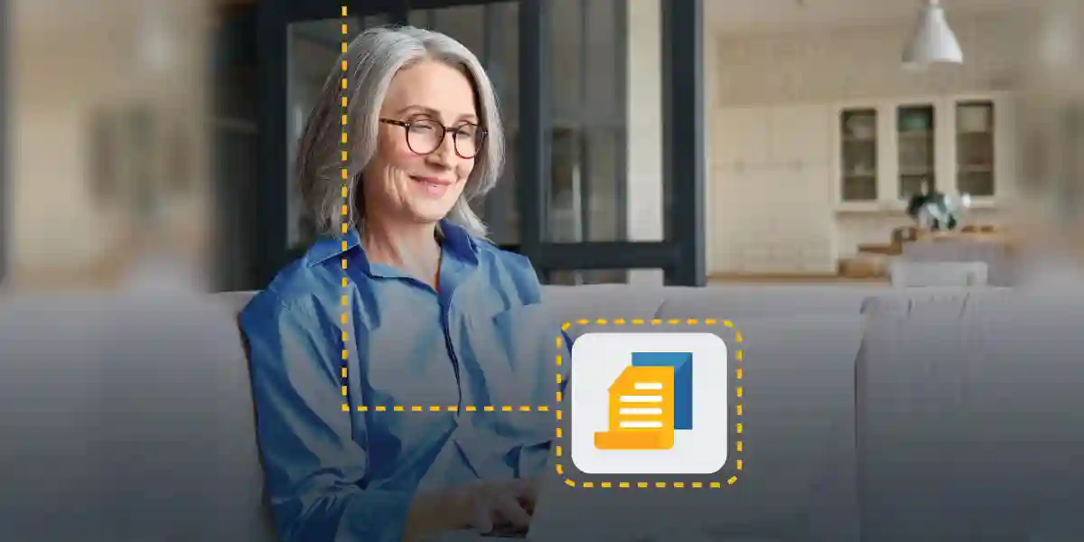 woman smiling while typing on her laptop next to a document icon to symbolize high-potential program success 