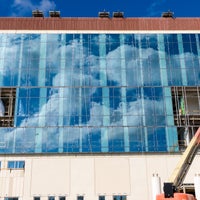 Clouds reflecting off of the building