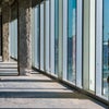 View of inside building looking through windows.