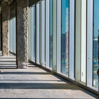 View of inside building looking through windows.