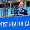 Mark Faulkner President and CEO, Baptist Health Care speaking at topping off beam celebration.