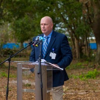 Scott Raynes President of Baptist Hospital speaking at new Health campus groundbreaking.