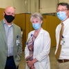 Scott Raynes, Cynde Gamache and Dr. Glisson wearing masks posing for picture.