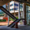 Inside of new Baptist Hospital looking out with metal stairway.