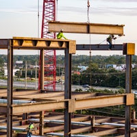 Cranes placing beams