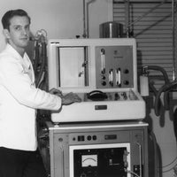 Team member shows new pulmonary function equipment - 1966.
