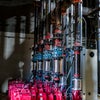 Liquid pumps with pipes attached.