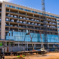 Glass being added to the building