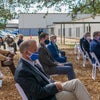 Invited guests at Baptist Health Care new campus groundbreaking listening to speaker