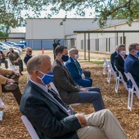 Invited guests at Baptist Health Care new campus groundbreaking listening to speaker