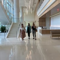 Team Members Stroll Hospital Concourse