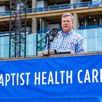 Guest speaking at topping out event celebration.