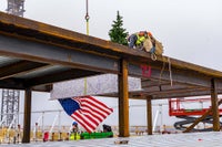 Setting the signed beam in place