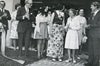 Mrs. Earl Gaston cuts ribbon opening for enlarged hospital.