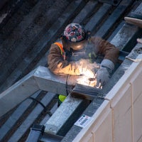 Man welding.
