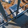 Overhead view of construction from metal platform.