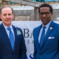 Mark Faulkner President and CEO, Baptist Health Care with guest at new Baptist Hospital campus.