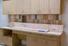 Cabinets and tile inside Bear Family Foundation Health Center