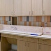 Cabinets and tile inside Bear Family Foundation Health Center