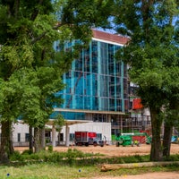 Image of Baptist campus through trees.