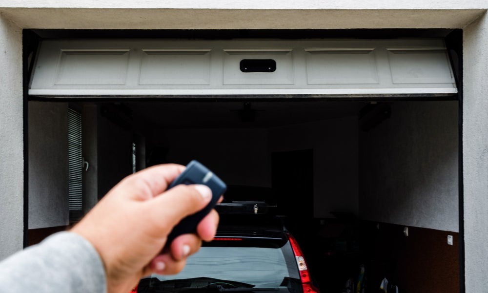 Hand use remote controller for closing and opening garage door.jpeg