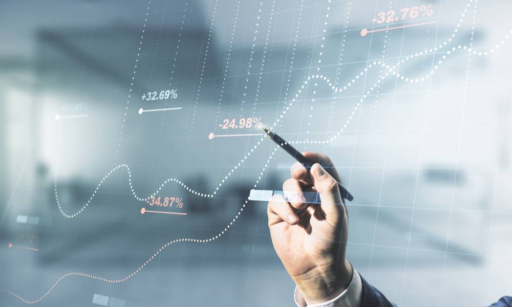 Hand pointing to virtual graph and spreadsheet (1).jpg