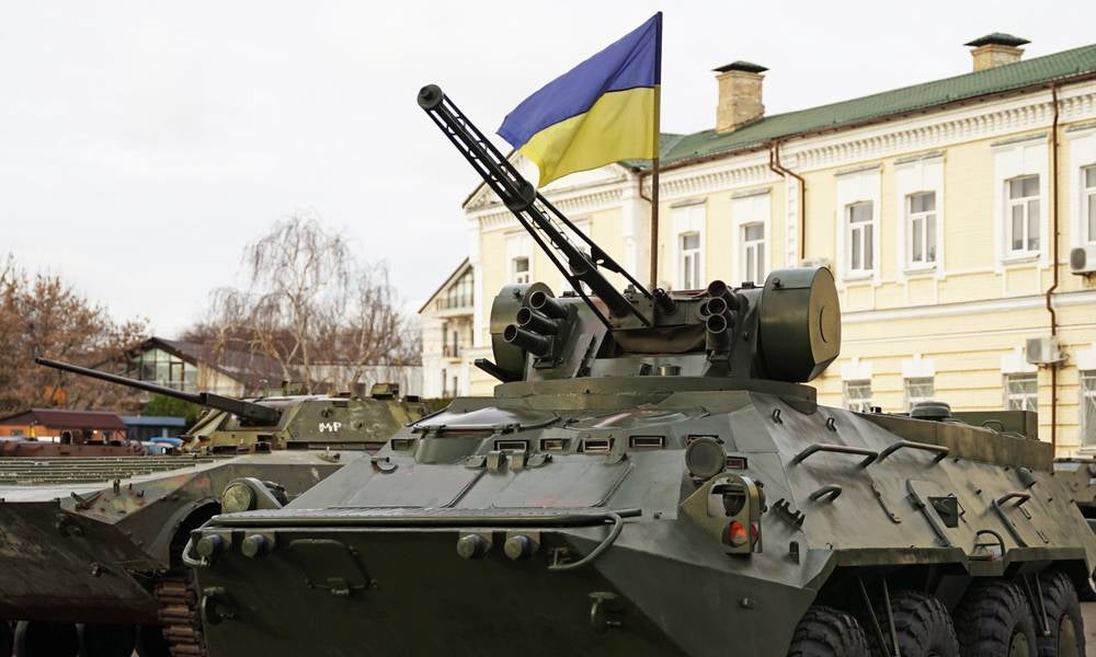 Tank with Ukrainian flag crypto donations flood to Ukraine.jpeg