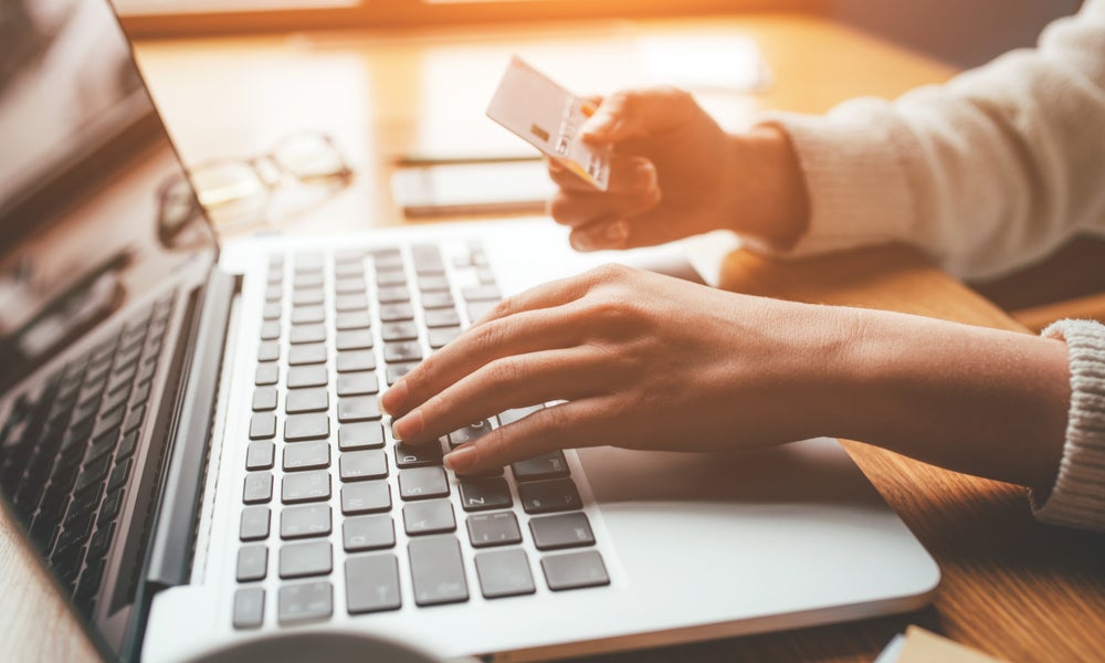 A young woman using online banking.jpeg