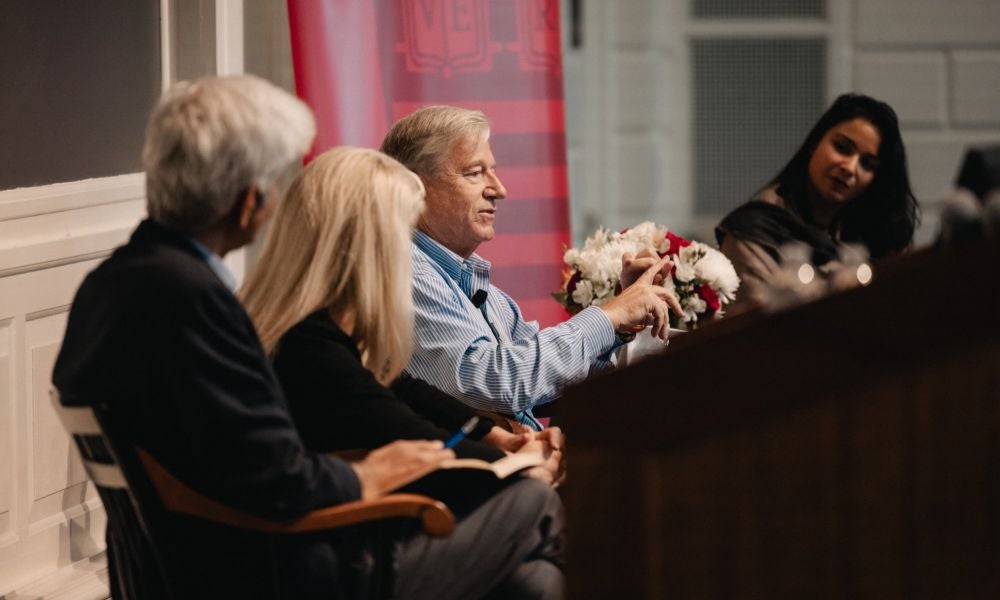 Grant Freeland (pictured here at the Harvard Happiness Symposium).jpg
